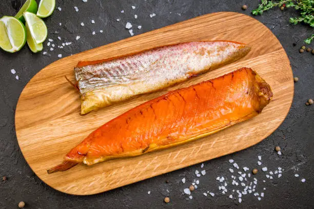 Photo of smoked trout on board