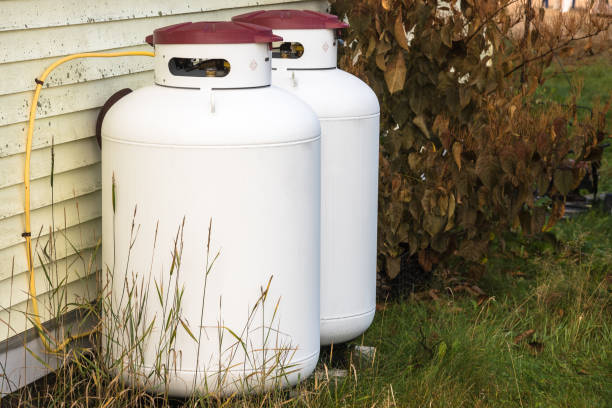 istock Propane cylinders in the backyard of a house 1221242731