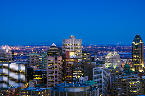 View of Montreal financial district at dusk in winter. Blue hour. Quebec, Canada.