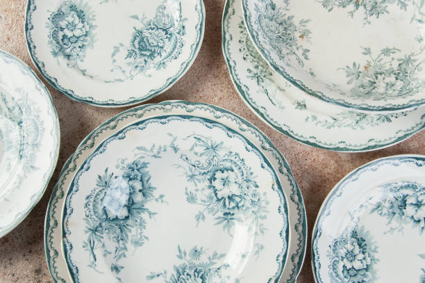 istock Antique porcelain dishes on concrete 1221246454