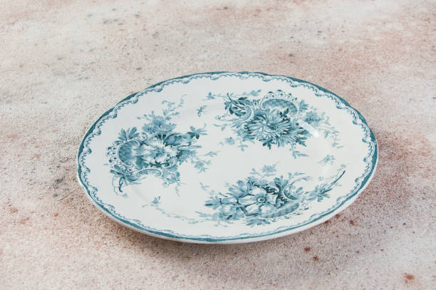 istock Antique porcelain dish on concrete 1221246466