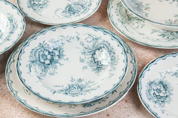 istock Antique porcelain plates on concrete 1221246726