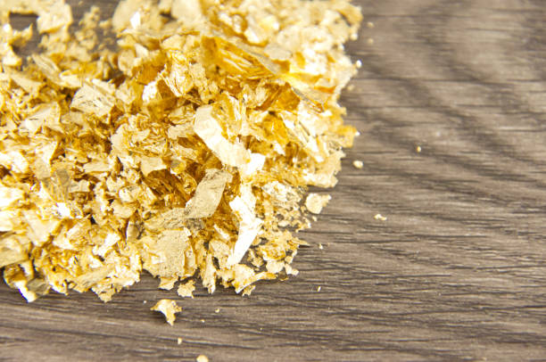 gold leaf Gold leaf on wood for gilding birch gold group review and prices stock pictures, royalty-free photos & images