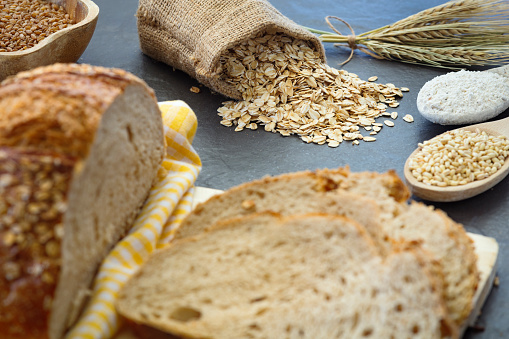 Baked homemade Sourdough bread. Focus on oat. Stock Photo