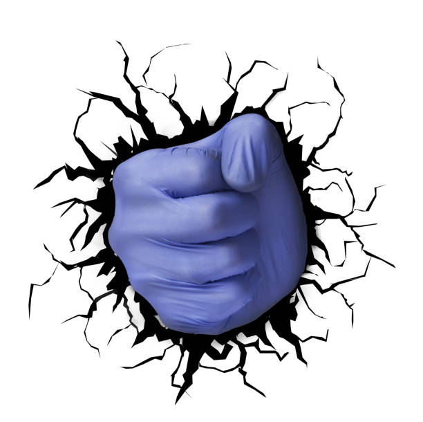 istock Doctor punch break the wall 1221253713
