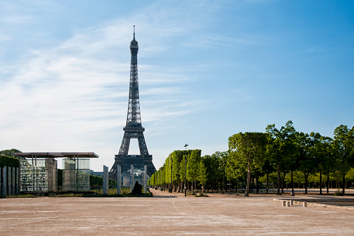 Tour Eiffel and Champ de Mars are empty during pandemic Covid 19 in Europe. There are no people, no tourists, because people must stay at home and be confine. Schools, restaurants, stores, museums... are closed. Paris, in France. April 26th , 2020.