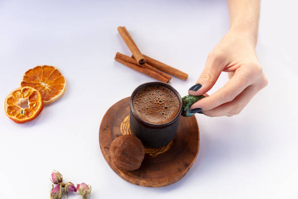 istock Woman drinking coffee with sweet dessert cake 1221257309