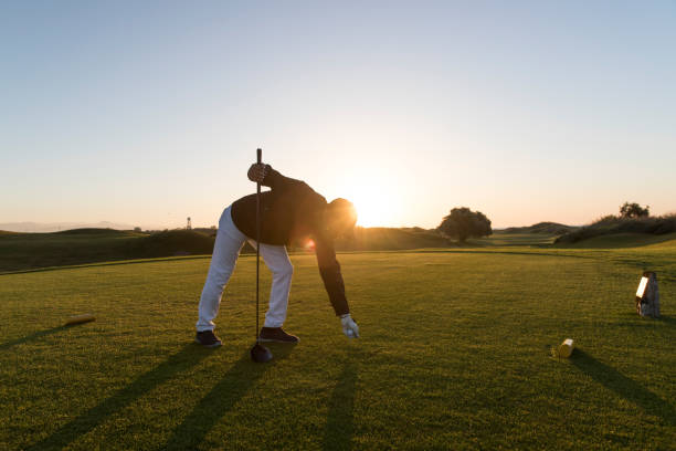 istock Golf player preparing for shoting - Photo At Sunset Time -  Links Golf Player 1221257390