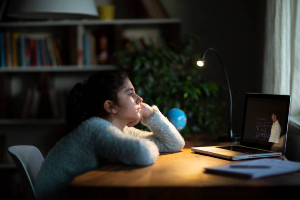 istock Coronavirus Outbreak. Lockdown and school closures. Schoolgirl watching online education class 1221258612