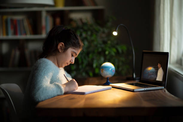 istock Coronavirus Outbreak. Lockdown and school closures. Schoolgirl watching online education class 1221258678