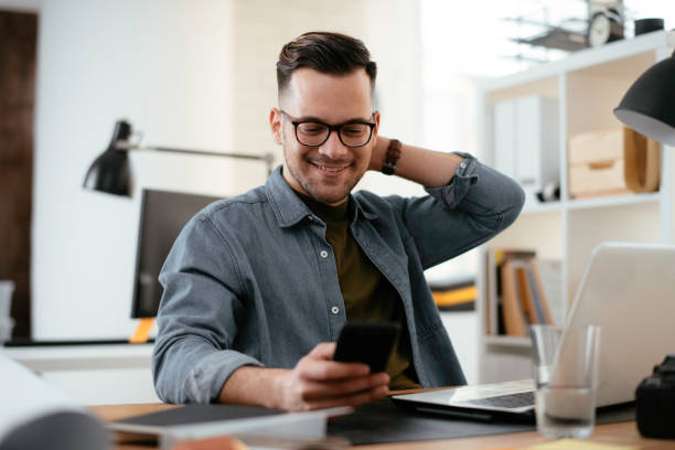 istock Handsome businessman working in office. 1221259436