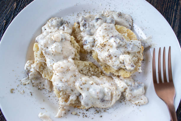 istock homemade breakfast sausage biscuits and gravy 1221261898