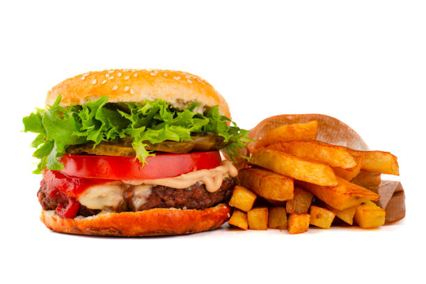 istock Hamburger with french fries on white 1221266202
