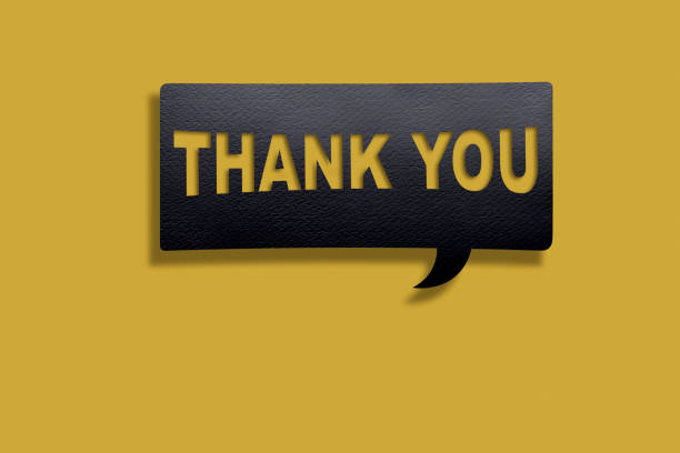 istock Thank You Message on Black Speech Bubble on Yellow Background with clipping path. 1221269122