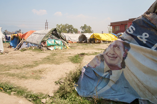 Kathmandu, Nepal - May 19, 2016: Tents set up for shelter and homes in a large field from different material for Kathamandu’s homeless.