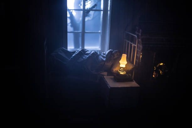istock Man comfortably sleeping in his bed at night 1221270030