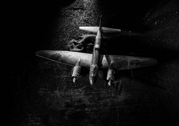 istock German Junker (Ju-88) night bomber at night. Artwork decoration with scale model of jet-propelled plane in possession. 1221270256