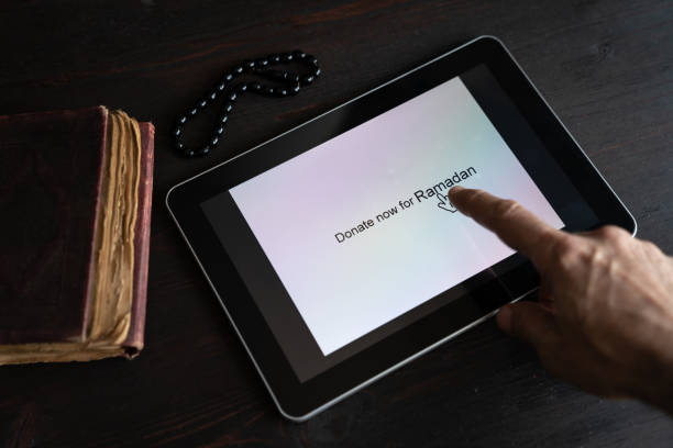 istock Online Ramadan Donation Via Digital Tablet 1221272657