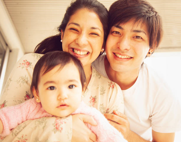 istock Happy family enjoying at home 1221273836