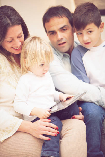 istock Family together at home 1221275960
