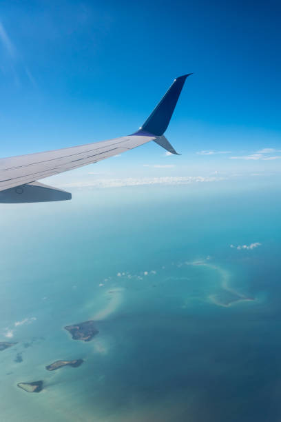 istock Plane over turquoise sea with small islands. Cuba. 1221276177