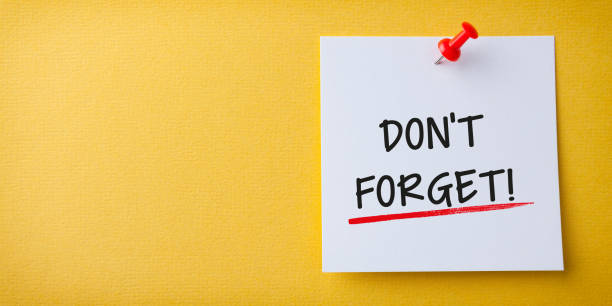 istock White Sticky Note With Don't Forget And Red Push Pin On Yellow Background 1221278105