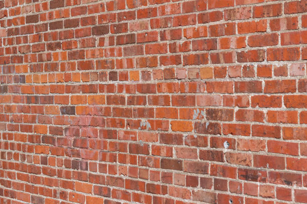 istock Antique shabby chic red clay brick wall texture background 1221278124