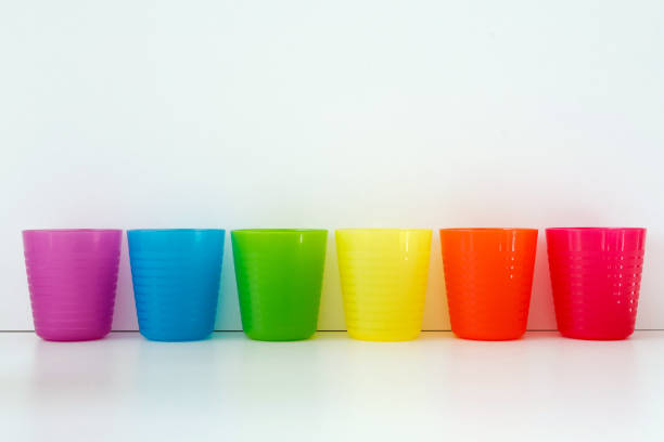 Colourful Rainbow Family Bowls And Cups on white kitchen counter