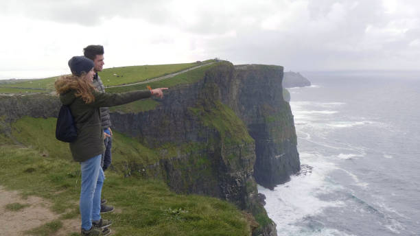 istock Two friends travelling to the Cliffs of Moher 1221280964