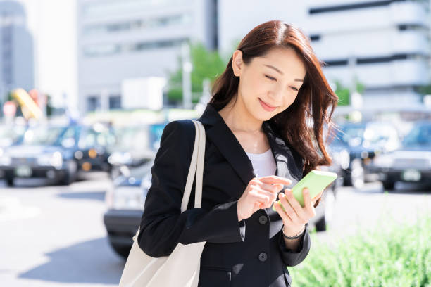 istock asian woman who see a smart phone 1221283762