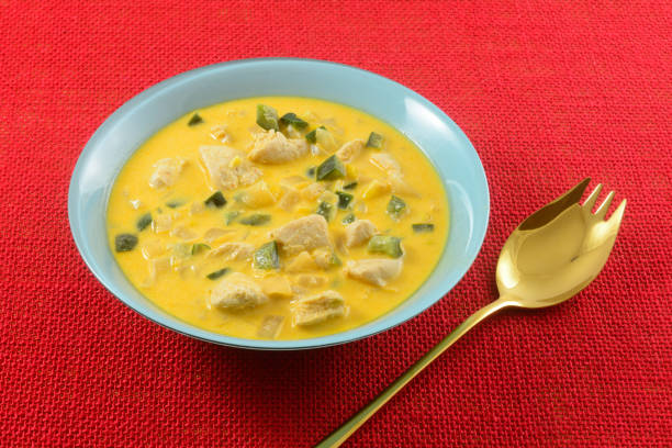 istock Chicken and vegetable chowder with spork 1221288468