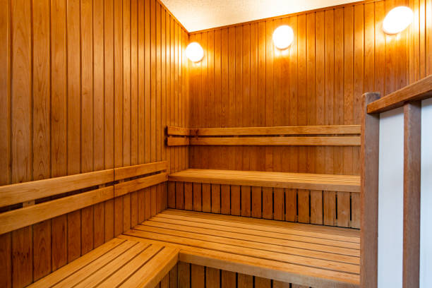 istock Small sauna room with wooden benches 1221291144