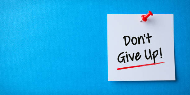 istock White Sticky Note With Don't Forget And Red Push Pin On Blue Background 1221291254
