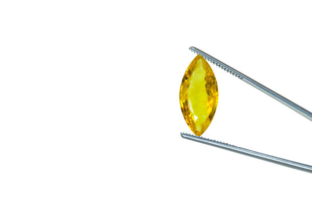 Natural yellow Sapphire gemstone isolated on white background