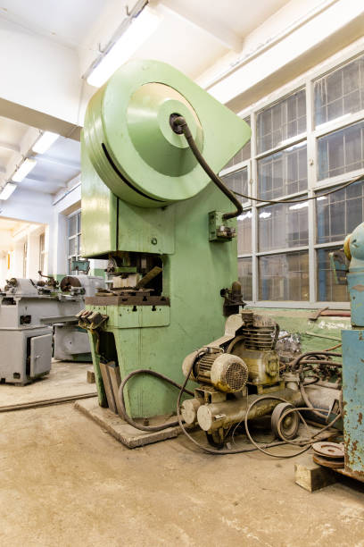 istock Old soviet hydraulic press in the production hall of an engineering plant 1221298626