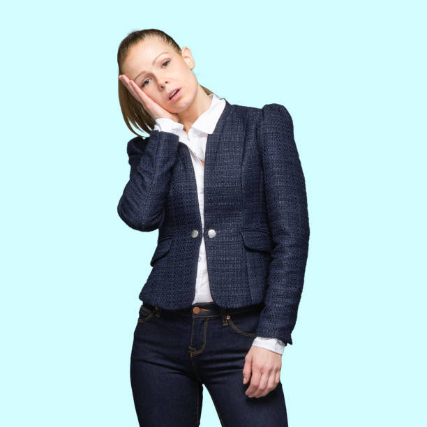 istock Generation z female standing in front of colored background wearing shirt 1221299683