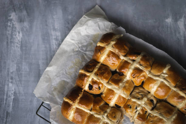 istock Fresh home made Hot Cross buns straight from the oven. 1221305597