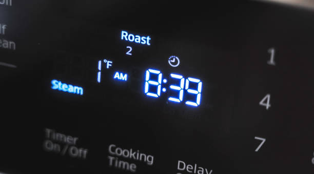 istock Close up of oven display flickering, control panel blinking. Stove electricity problem 1221306206
