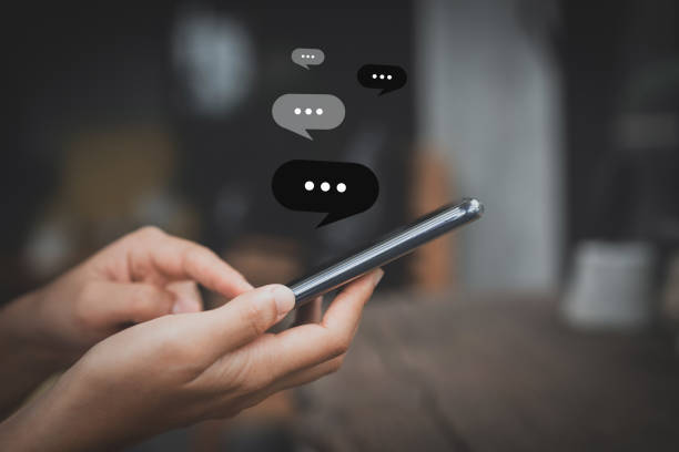 istock Woman hand using smart phone at coffee shop with email icon flying and line dot abstract. 1221310152