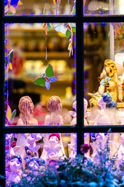 The window through which the visible Christmas decorations. Christmas time concept.