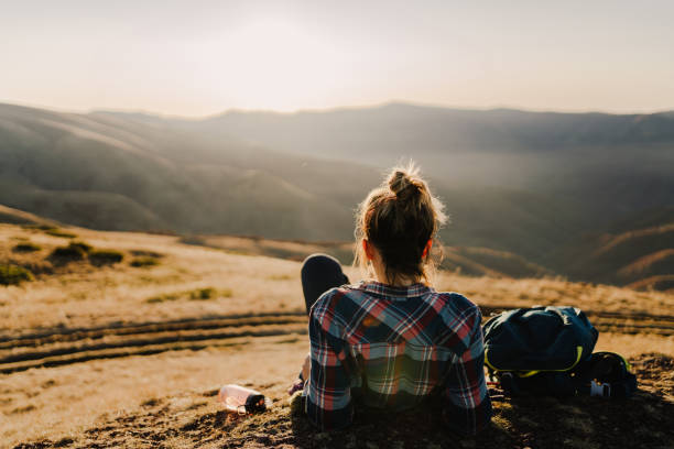 istock Lonely hiker resting on a mountain peak 1221311564