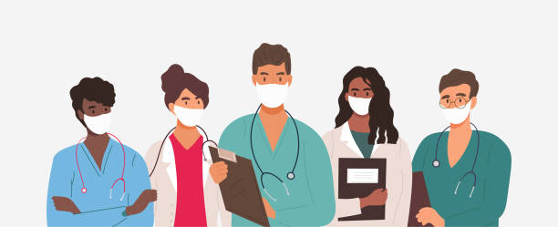Diverse group of medics or health workers Diverse group of medics or health workers standing in a line wearing uniforms and face masks during the Covid-19 pandemic in a panorama banner, vector illustration frontline worker mask stock illustrations