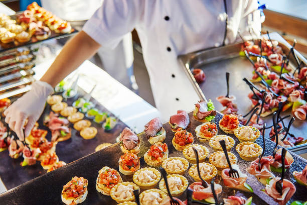 istock Hands of a cater 1221313388
