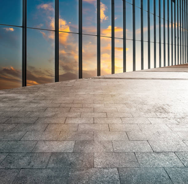 istock The white glass wall beside the stone square 1221313507