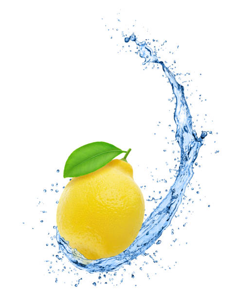 istock Whole lemon with leaf in water splash isolated on white background. 1221313881