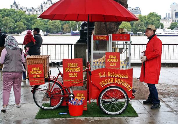 London/United Kingdom; 10/19/2013. Popcorn cart next to the River Thames in London.