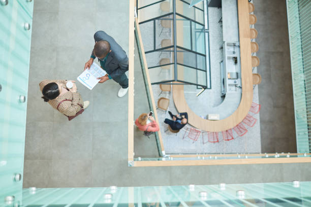 istock Business people working at office corridor 1221314779