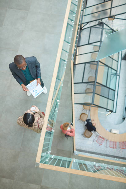 istock Business couple discussing contract 1221314791
