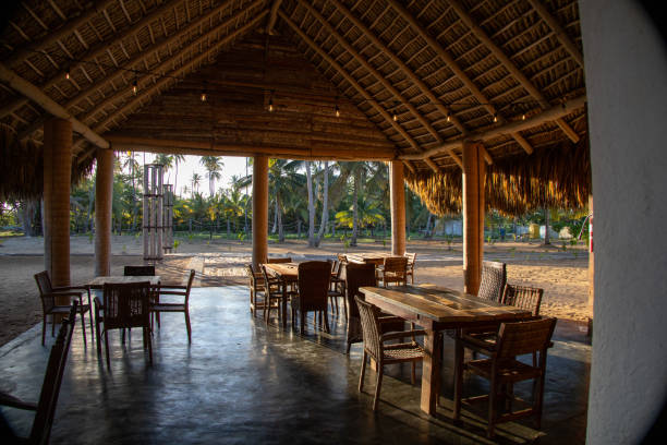istock Tropical beach restaurant at sunrise 1221319941