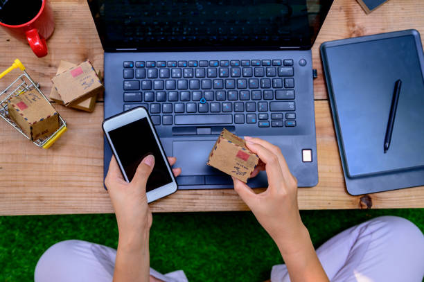 istock Online shopping and Home delivery. Entrepreneur using innovation technology on tablet and mobile for selling online. Startup SME business and mail delivery. Lock down and Self-quarantine at home. 1221320034